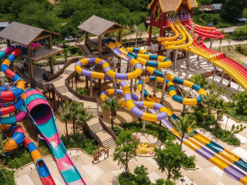 Andamanda Water Park Phuket: A vibrant aerial view of Andamanda Water Park Phuket featuring colorful water slides and family-friendly attractions.