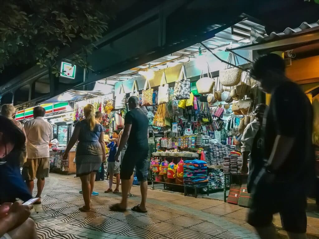 phuket night markets: Tourists shopping at Phuket night market stalls